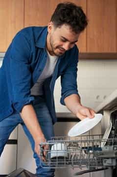 Man Using a Dishwasher